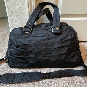 Good condition Ivivva Lululemon black duffel bag